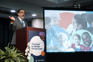 John Ohanian speaking at the 2025 DxF Summit